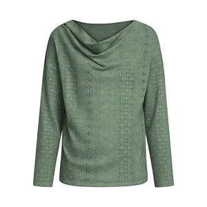 Detail of sage green long sleeve top with cowl neck and eyelet embroidery fabric