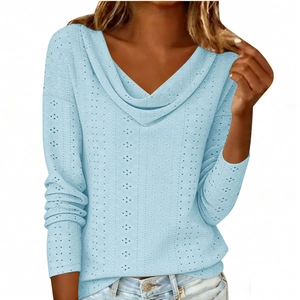 Detail of light blue cowl neck top with breathable pointelle eyelet knit texture