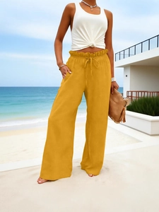 Women's high waist ginger cotton linen wide leg trousers with drawstring on beach