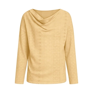 Detail of cowl neck top in yellow with vertical hollow embroidery and polka dot texture