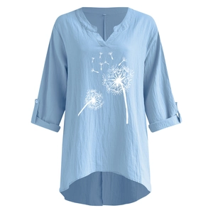 Detail of light blue linen V-neck shirt with white dandelion print and adjustable sleeves