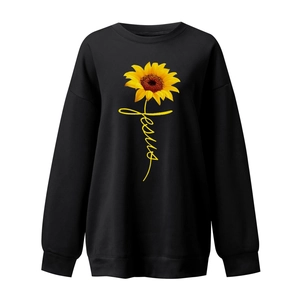 Detail of sunflower and Jesus script print on the black long-sleeve crewneck sweatshirt