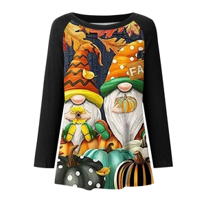 Detail of autumn gnome and pumpkin print on long sleeve crewneck t-shirt for women
