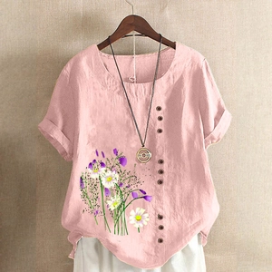 Camisa rosa de manga corta en algodón y lino con estampado de margaritas y botones