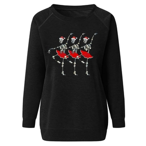 Detail of a black crewneck sweatshirt featuring creative dancing Christmas skeletons graphic