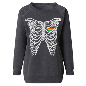 Detail of charcoal grey Halloween sweatshirt with ribcage print and rainbow heart detail