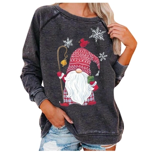 Detail of Christmas gnome print on vintage washed charcoal gray oversized sweatshirt