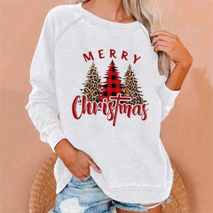 Close-up of white Christmas sweatshirt with leopard print and plaid tree graphics