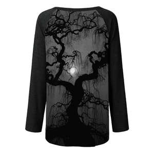 Detail of gothic long sleeve top featuring dark moon and withered tree back print design