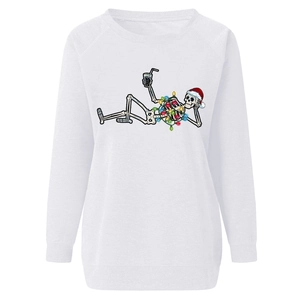 Detail of Christmas skeleton print with red hat and lights on white crewneck sweatshirt