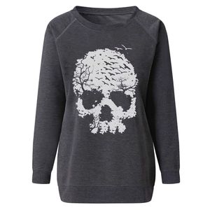 Detail of creative skull graphic made of trees and birds on grey sweatshirt fabric