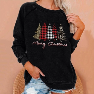 Detail of Christmas tree prints and Merry Christmas script on black sweatshirt