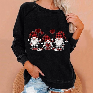 Close-up of black crewneck sweatshirt featuring three festive Christmas gnomes print detail