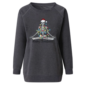 Detail of grey raglan sweatshirt with Christmas skeleton print and Merry Christmas text