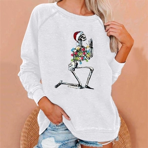 White crewneck sweatshirt featuring a creative Christmas skeleton print and red Santa hat