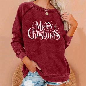 Detail of the soft brushed fleece texture and Merry Christmas print on maroon sweatshirt