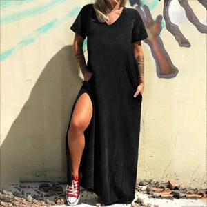 Detail of a black V-neck maxi dress with short sleeves and a stylish side high split feature