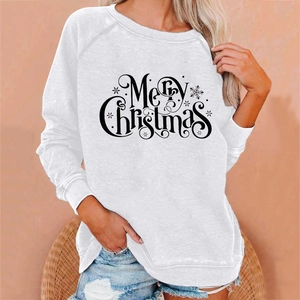 Detail of white Christmas sweatshirt with black Merry Christmas print and ribbed cuffs