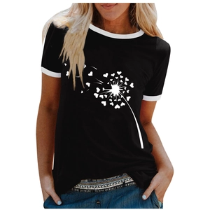 Close-up of heart-shaped dandelion print and white contrast trim on a black T-shirt