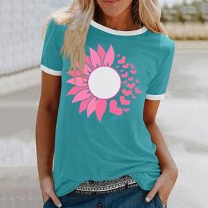 Detail of teal women's t-shirt showing white ribbed crew neck and pink flower print