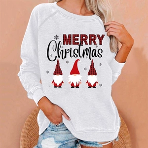 Detail of Christmas sweatshirt featuring gnomes and Merry Christmas print on white fabric
