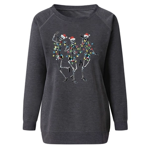 Detailed view of skull Christmas graphic print on dark grey crewneck sweatshirt