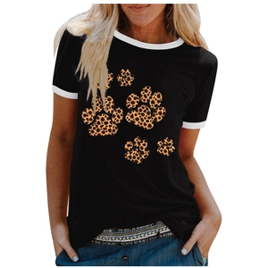 Detail of black ringer t-shirt featuring leopard print paw graphics and white contrast trim