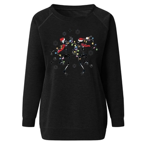 Detail of Christmas skeleton print on black raglan sweatshirt with colorful lights