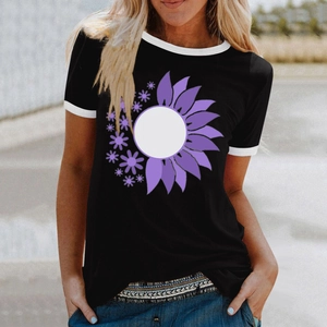 Close-up of black t-shirt featuring a purple floral print and white contrast neckline