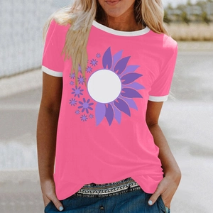 Detail of pink cotton t-shirt featuring purple floral print and white contrast trim