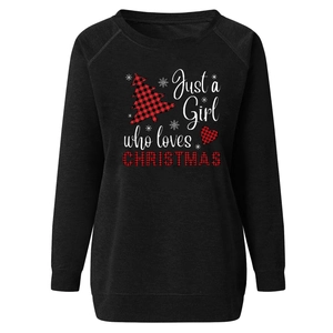 Detailed view of black Christmas sweatshirt with buffalo plaid tree and festive text print