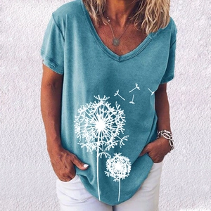 Detail of the V-neckline and white dandelion print on the blue short sleeve T-shirt