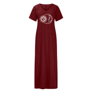 Detail of burgundy V-neck maxi dress featuring sun and moon print on knitted fabric