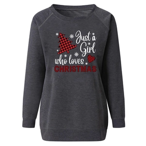 Detailed view of dark grey Christmas sweatshirt with plaid tree print and ribbed hem
