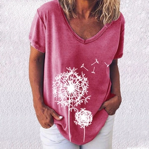 Close-up of elegant V-neckline and white dandelion print on pink short sleeve t-shirt