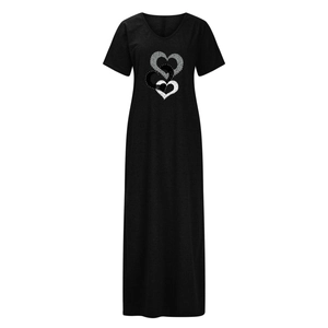 Detail of V-neckline and triple heart print on black dandelion casual split dress