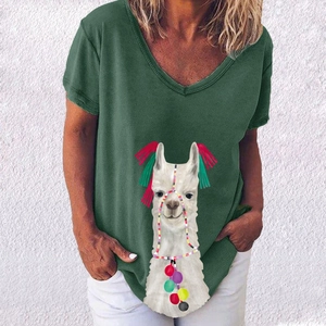 Close-up of V-neck dark green T-shirt featuring a white alpaca print and ethnic tassels