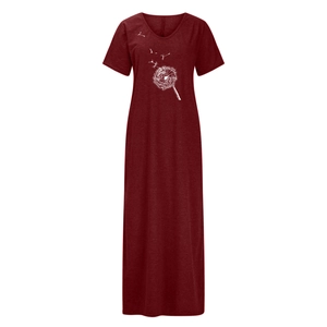 Close-up of dandelion print on dark red V-neck maxi dress with soft knit texture