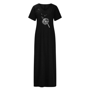 Detail of V-neck short sleeve black maxi dress featuring white dandelion graphic print