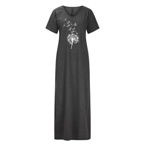 Detailed view of white dandelion print on dark gray V-neck maxi dress with split hem