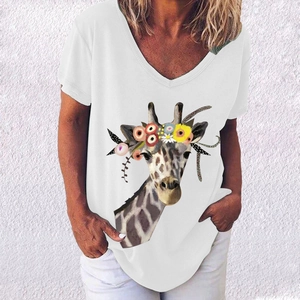 Close-up of white V-neck T-shirt featuring a colorful giraffe with floral wreath print