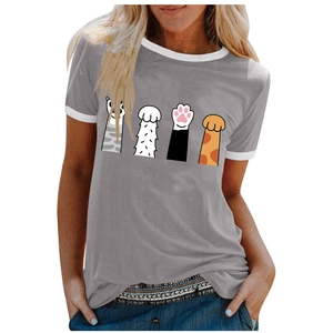 Detail of grey t-shirt showing white ribbed crewneck and four colorful cartoon cat paws
