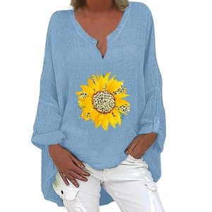Detail of V-neck collar and sunflower print with leopard pattern on cotton linen shirt