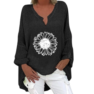Close-up of V-neck cotton linen shirt with white sunflower print and button cuffs
