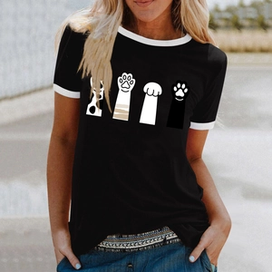 Detail view of contrast white ringer neckline and four cartoon cat paw prints on a black tee