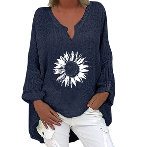 Detail of navy blue V-neck linen shirt for women featuring white sunflower print