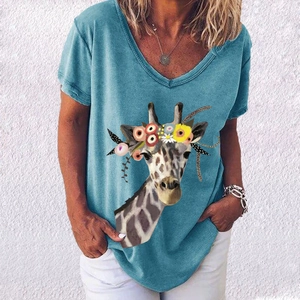 Close-up of women's V-neck T-shirt in washed blue with giraffe and floral print