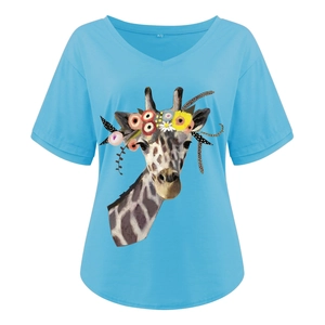 Detail view of V-neck sky blue t-shirt featuring a colorful giraffe graphic and size M label