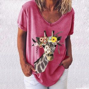 Close-up of a brick red V-neck T-shirt featuring a creative giraffe floral print