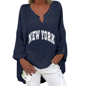 Detail of navy cotton-linen V-neck shirt with New York letter print and high-low hem